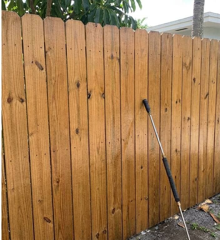 Wood fence restoration after pressure washing Miami